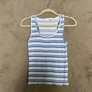 Tank top. Med . Light blue and white. Lightly worn.